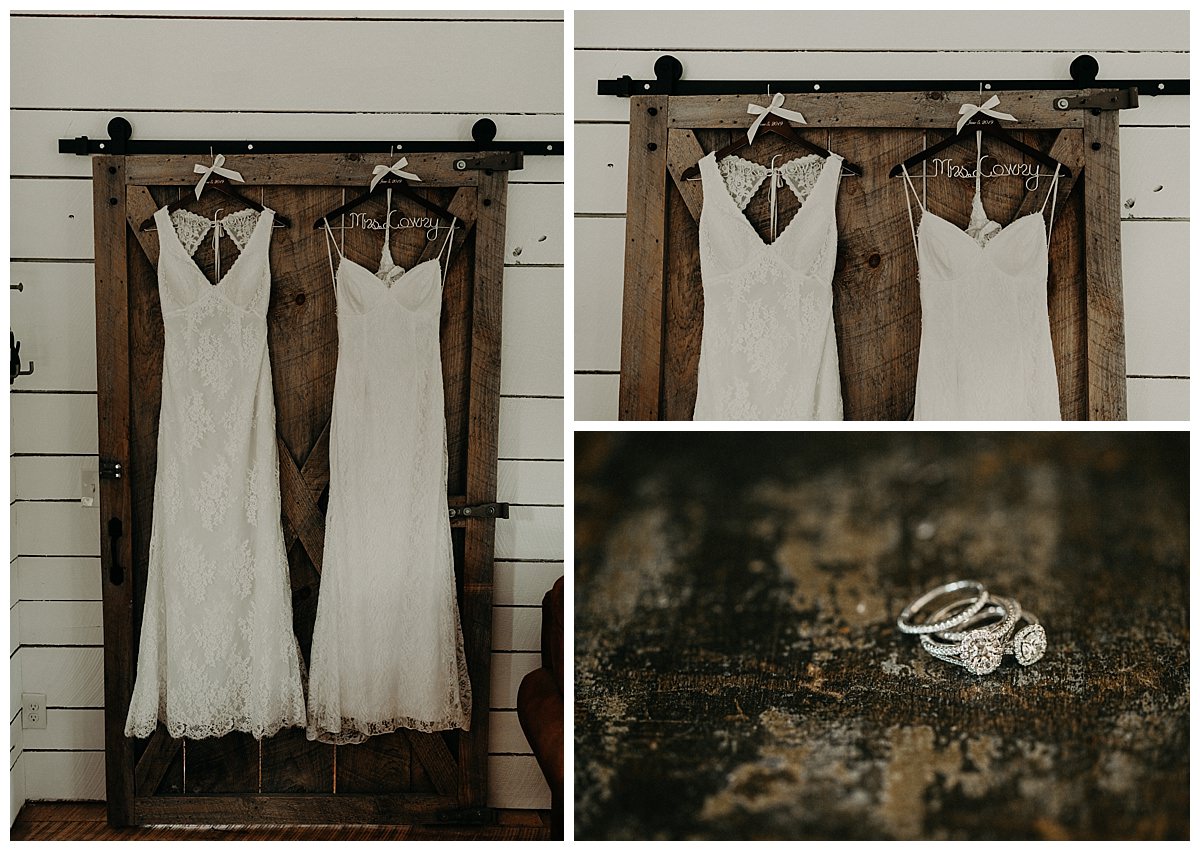 Two wedding dresses hanging on a door showing that two brides are about to marry each other.
